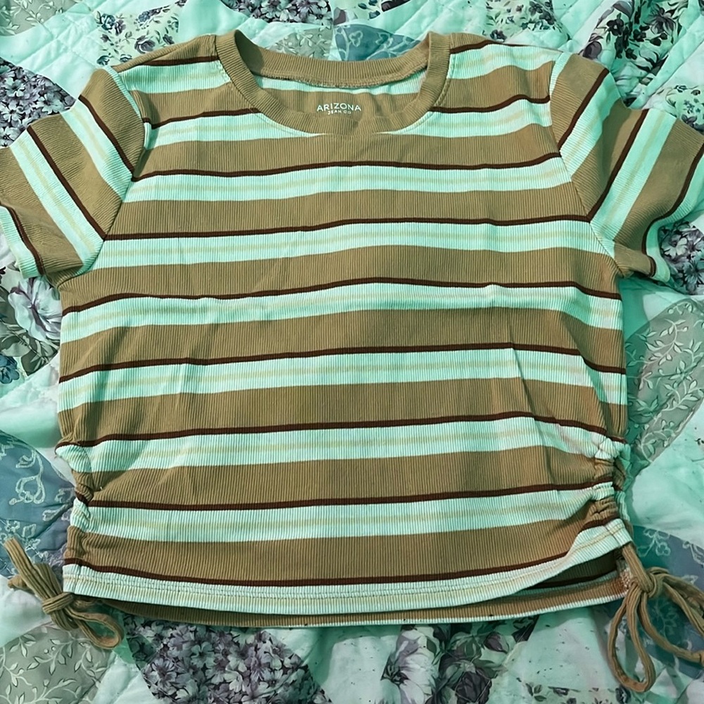 A yellow and white pattern crop top.